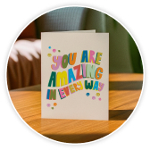 A greetings card with a 'thank you' message