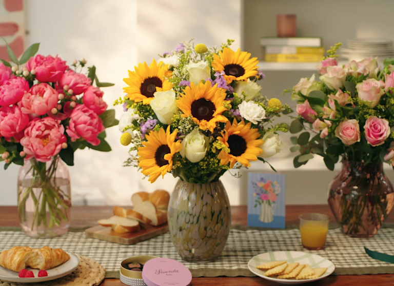 thre bouquets on tabe