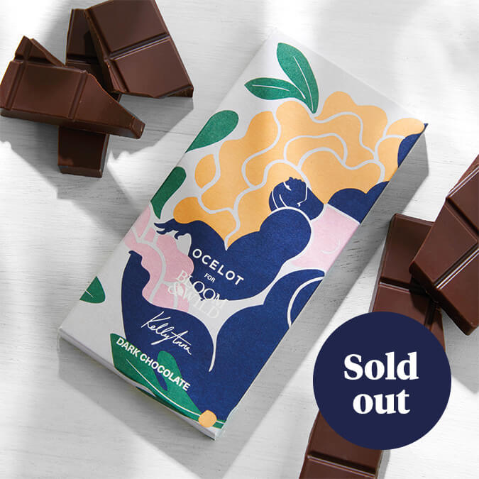 A stylish chocolate bar packaging, printed with a bold, abstract Kelly Anna design. A label on the image says 'Sold out'