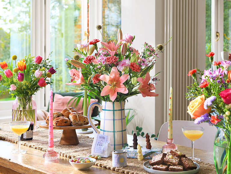 bouquet of lilies and tulips on table