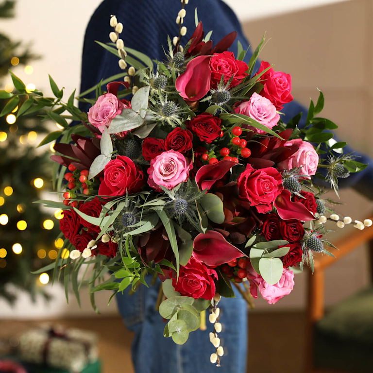 A large pink and burgundy boquet
