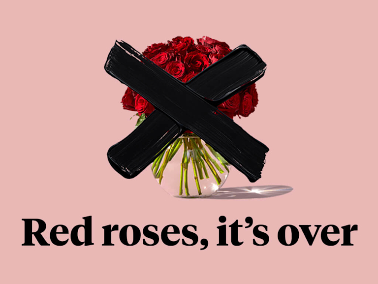 A dozen red roses with a big black cross over them. Text below reads 'Red roses, it's over'
