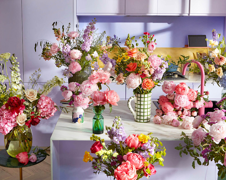 group shot of pastel peony bouquets