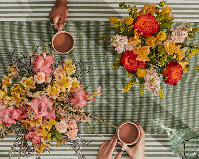 cups of tea on picnic table