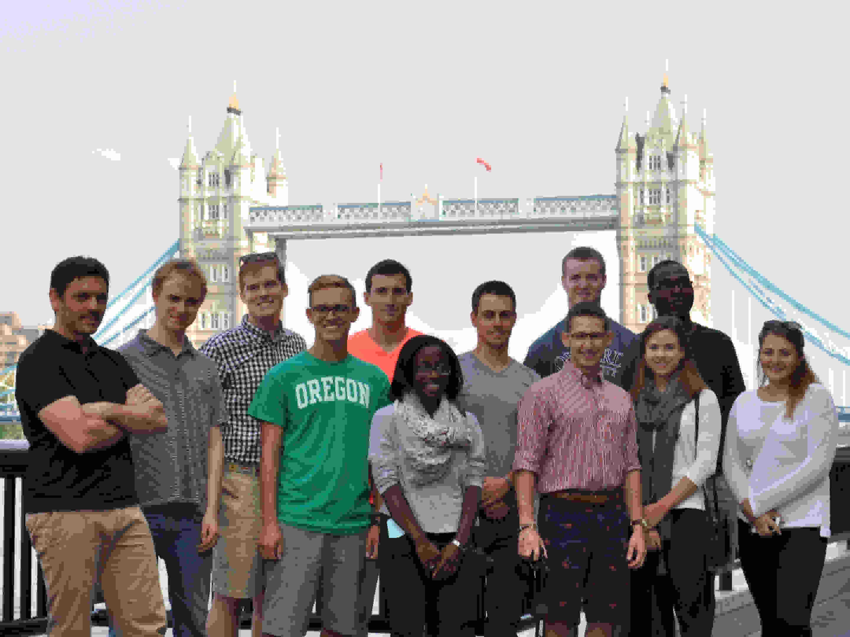 Photo of Hansard Society Scholars on the Thames' southbank, London, with Tower Bridge in the background