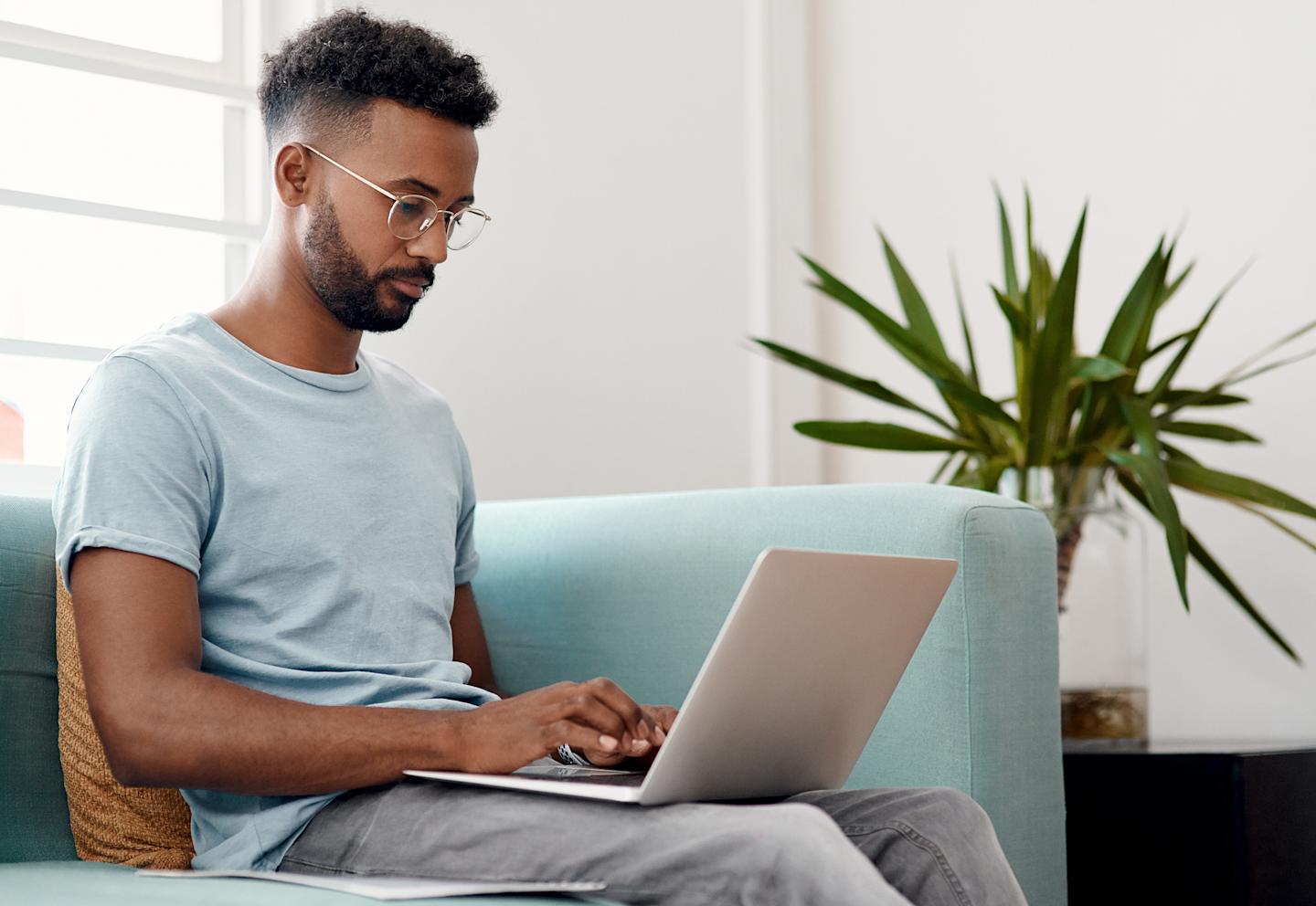 A person doing work on their laptop.