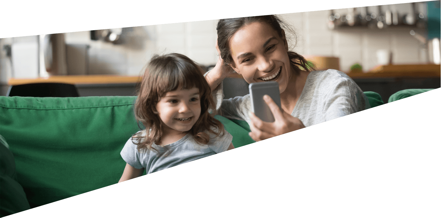 A mother and her toddler on a video call with a doctor.