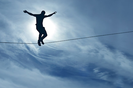 Man walking on a tight-rope