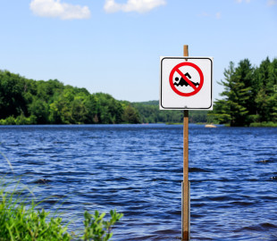 no swimming sign at lake