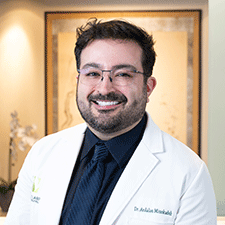 Headshot of Ardalan Minokadeh, MD, FAAD