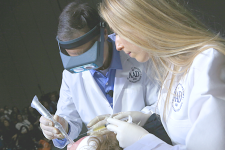dermatologist with a patient
