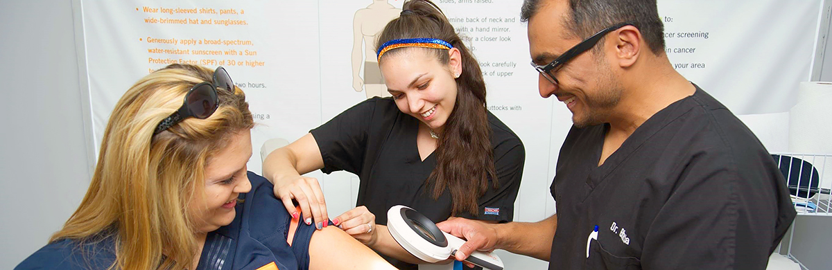 Dermatologists performing skin cancer screening