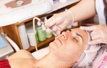 Women getting microdermabrasion