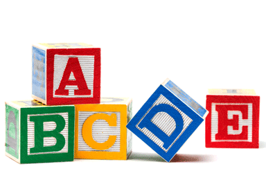 Wooden ABCDE play blocks on white background