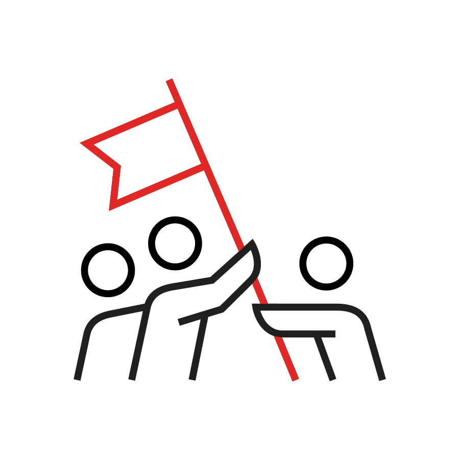 People holding up a flag