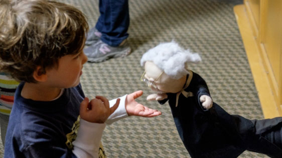 Ask your child to tell you a story using puppets...