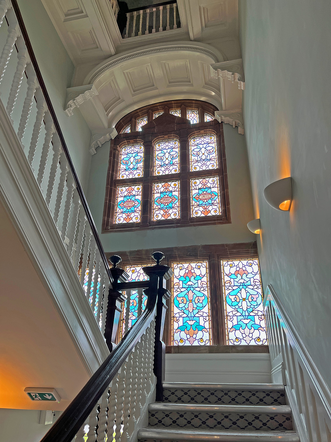 The central atrium with original staircase and beautiful wall of stained glass. What company today would build such an elaborate and ornate building?