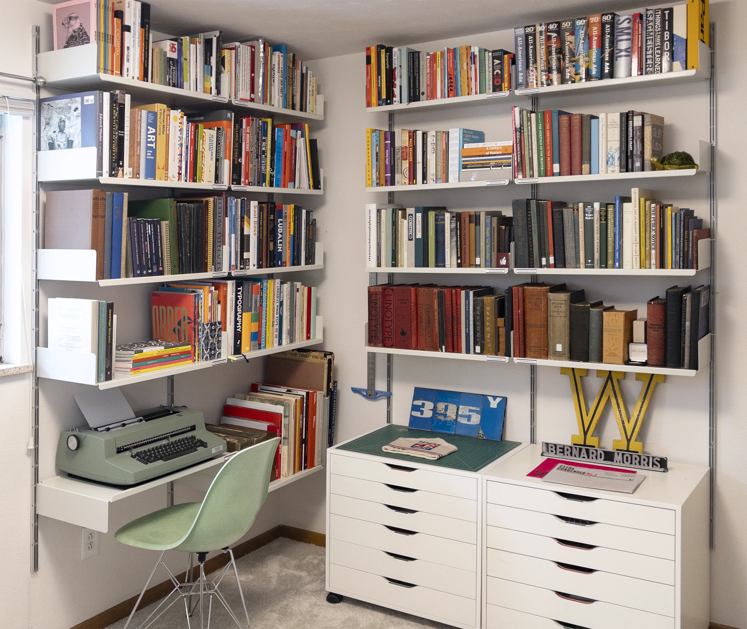 My new library using the Vitsœ 606 Universal Shelving System, IKEA Alex Drawer Units, and a Modernica shell chair