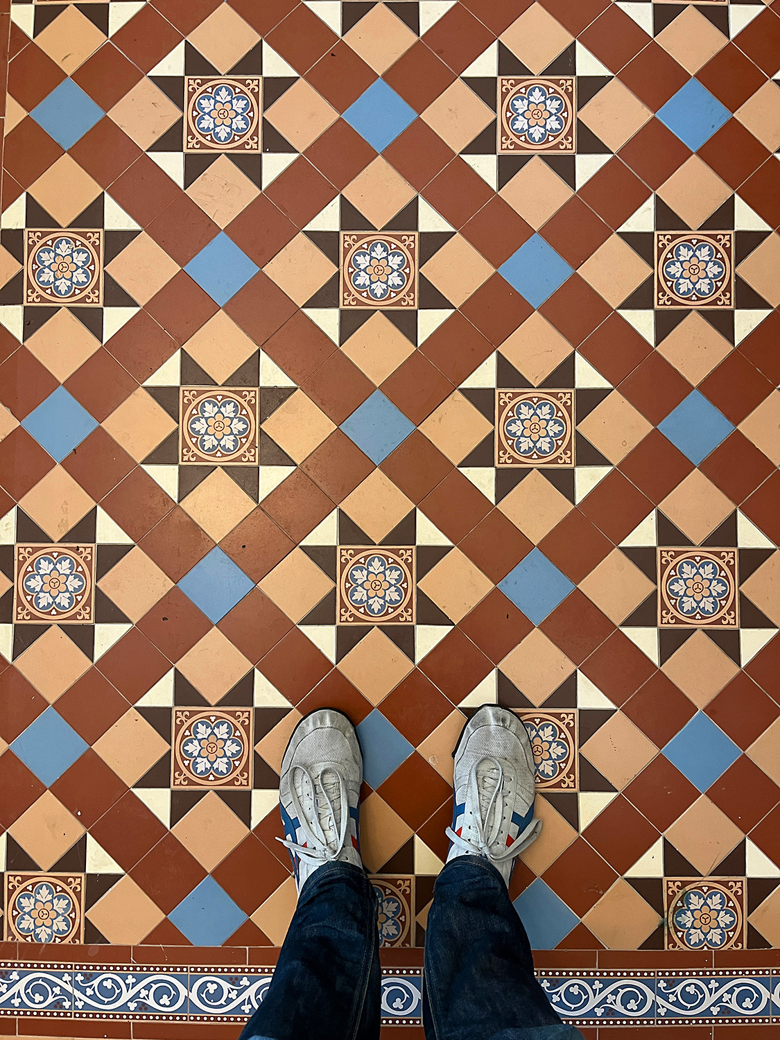 Original tile floors in the entryway of the admin building.