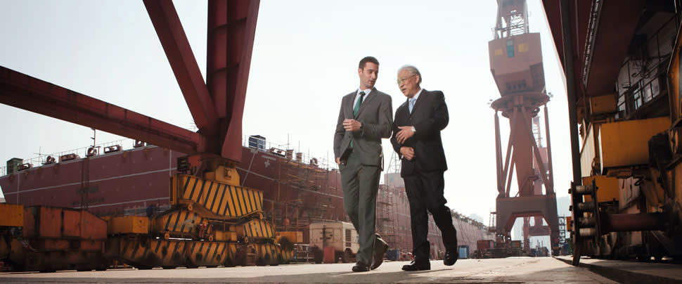 Business men in harbour area