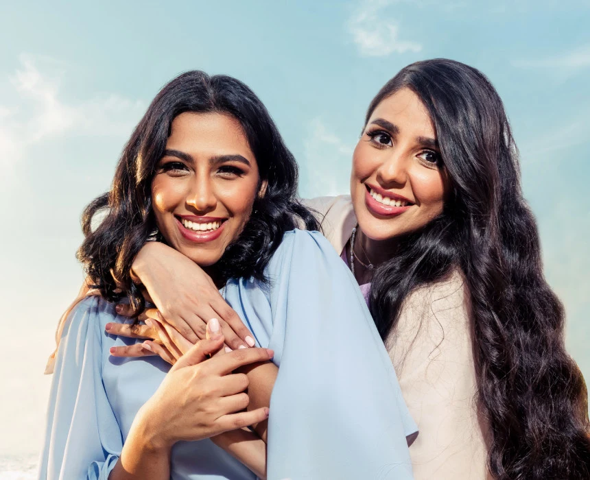 Two women smiling
