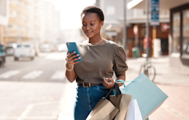 Young woman shopping on mobile phone