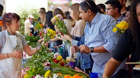 photo of people at a flower market
