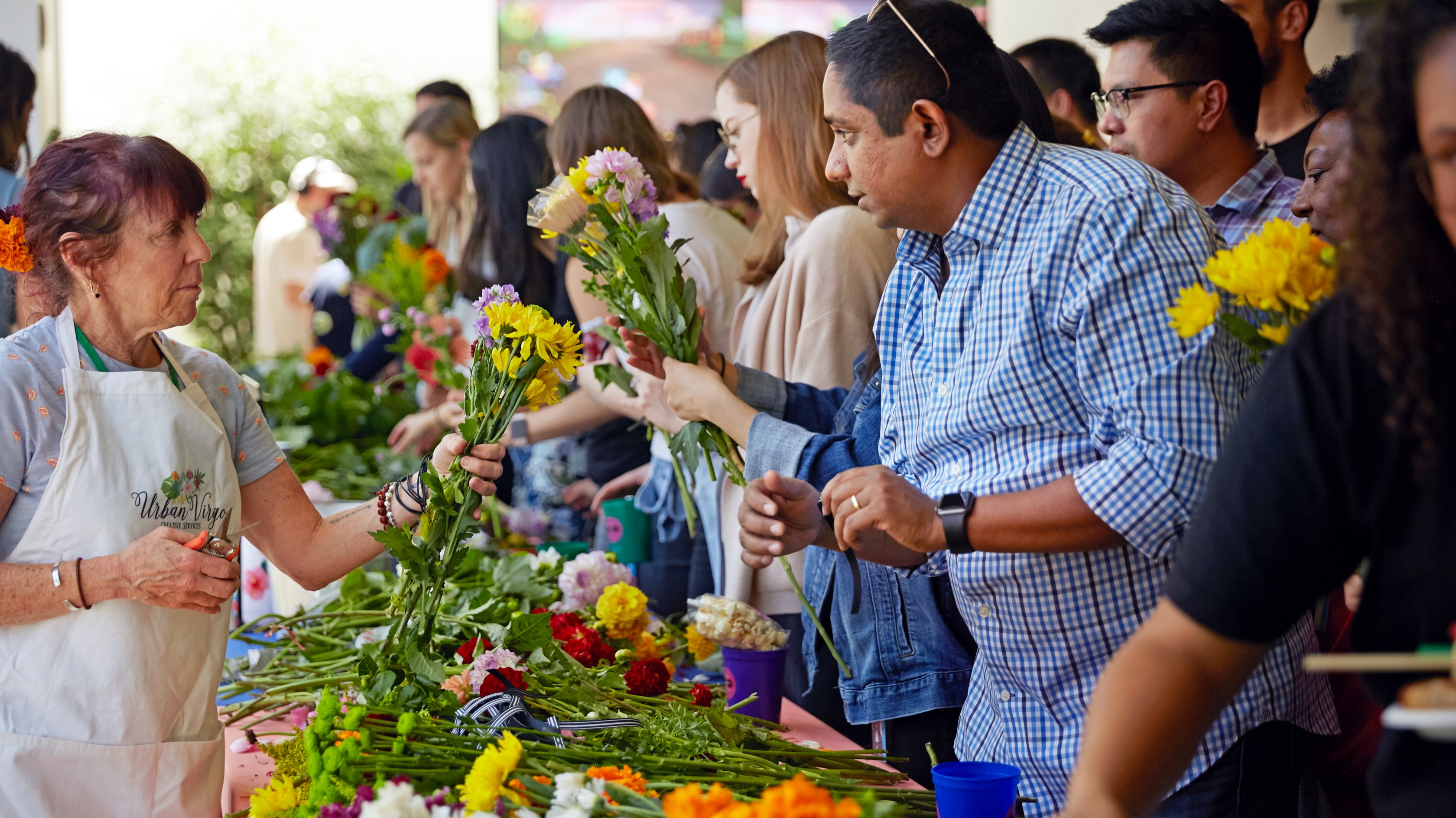 photo of people at a flower market