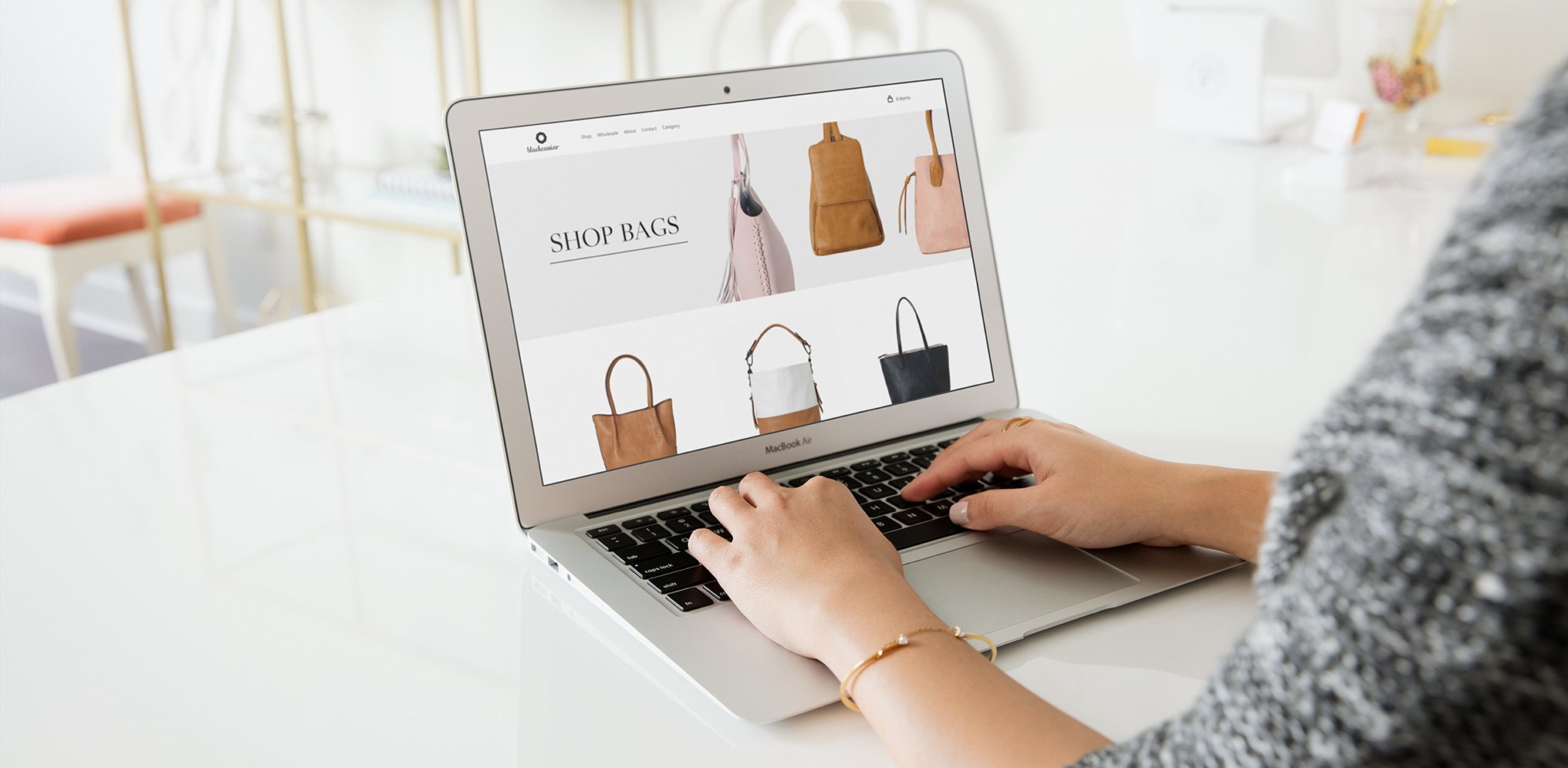 Laptop with Weebly customer page in Tori Blush environment