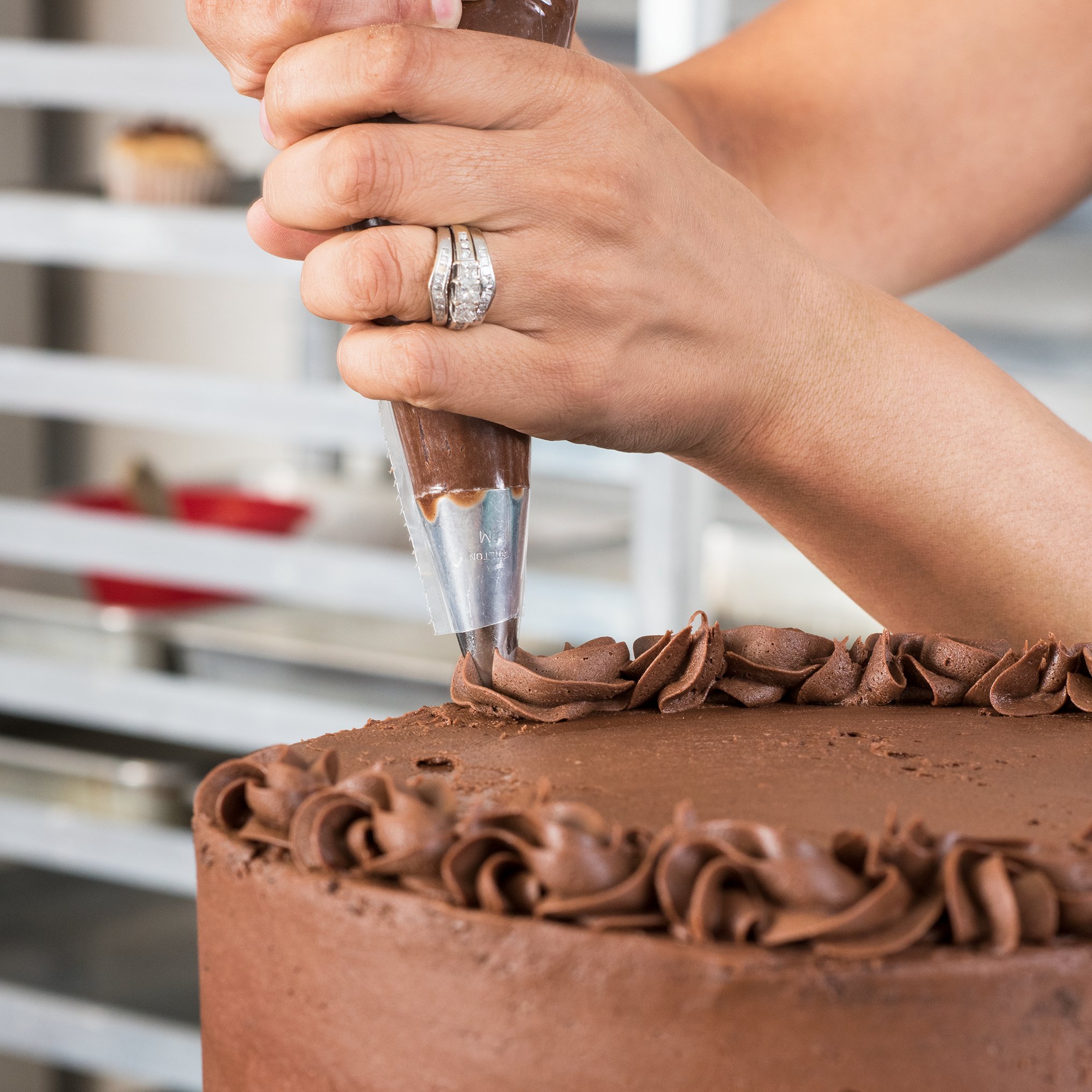 A cake being decorated at Hannah's Bakery