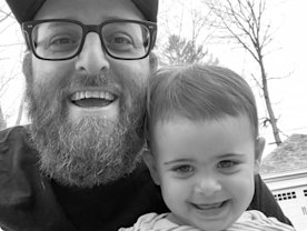 Photo of Dave Brown and his child