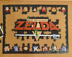 a partially completed puzzle spells out The Legend of Zelda