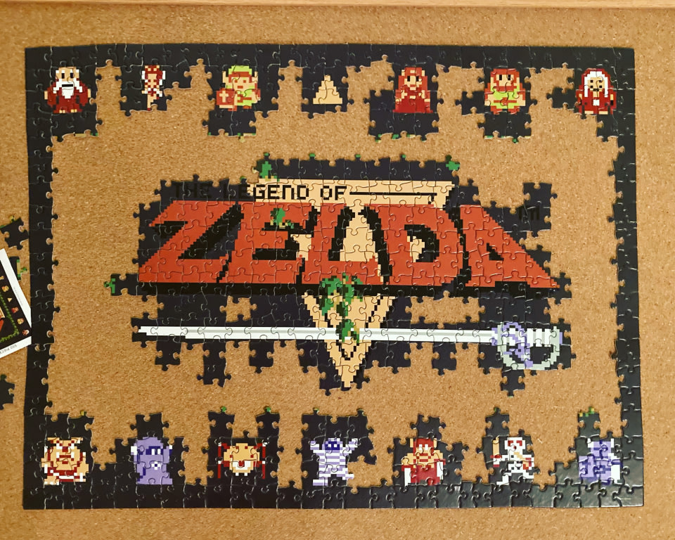 a partially completed puzzle spells out The Legend of Zelda