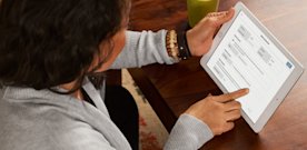 Image of Mimi W. of SEYA Crossfit & Wellness in Baltimore using Square Payroll on an iPad