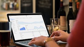 Business owner looking at a break-even point analysis