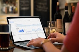 Business owner looking at a break-even point analysis