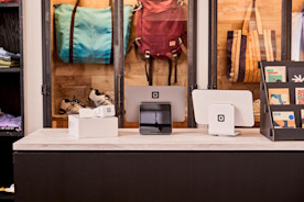 Photo of a Square Stand on a countertop in a retail store