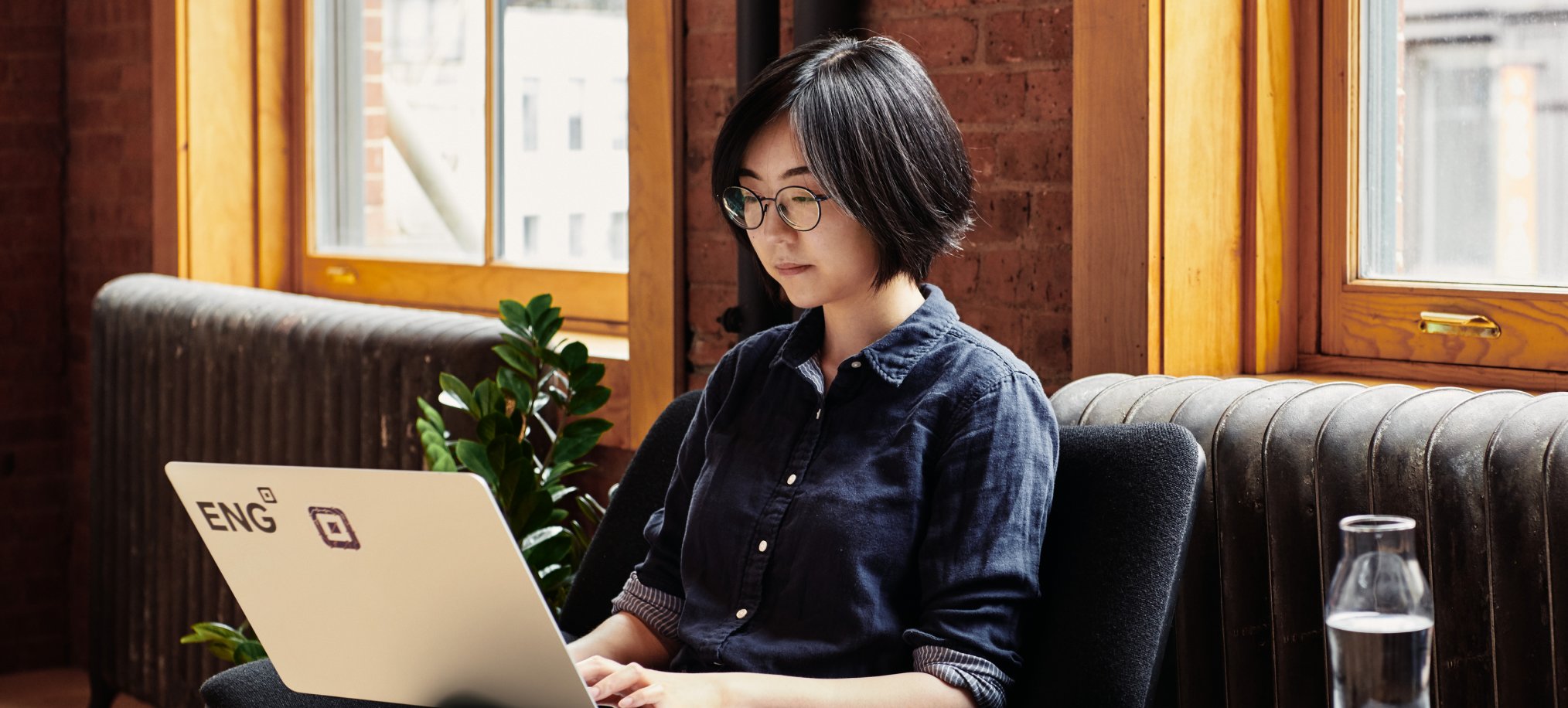 photo showing a person using a laptop
