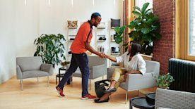 photo of two people shaking hands