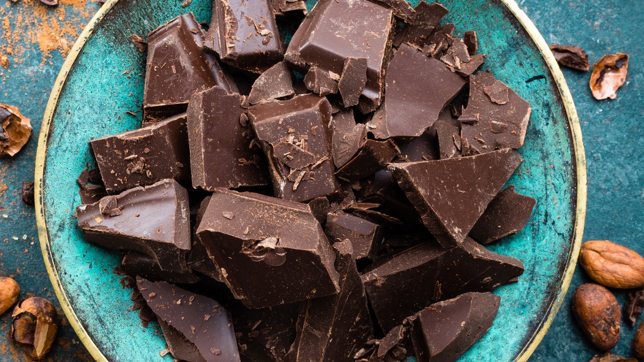 Roughly chopped up chocolate on a plate