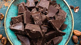 Roughly chopped up chocolate on a plate