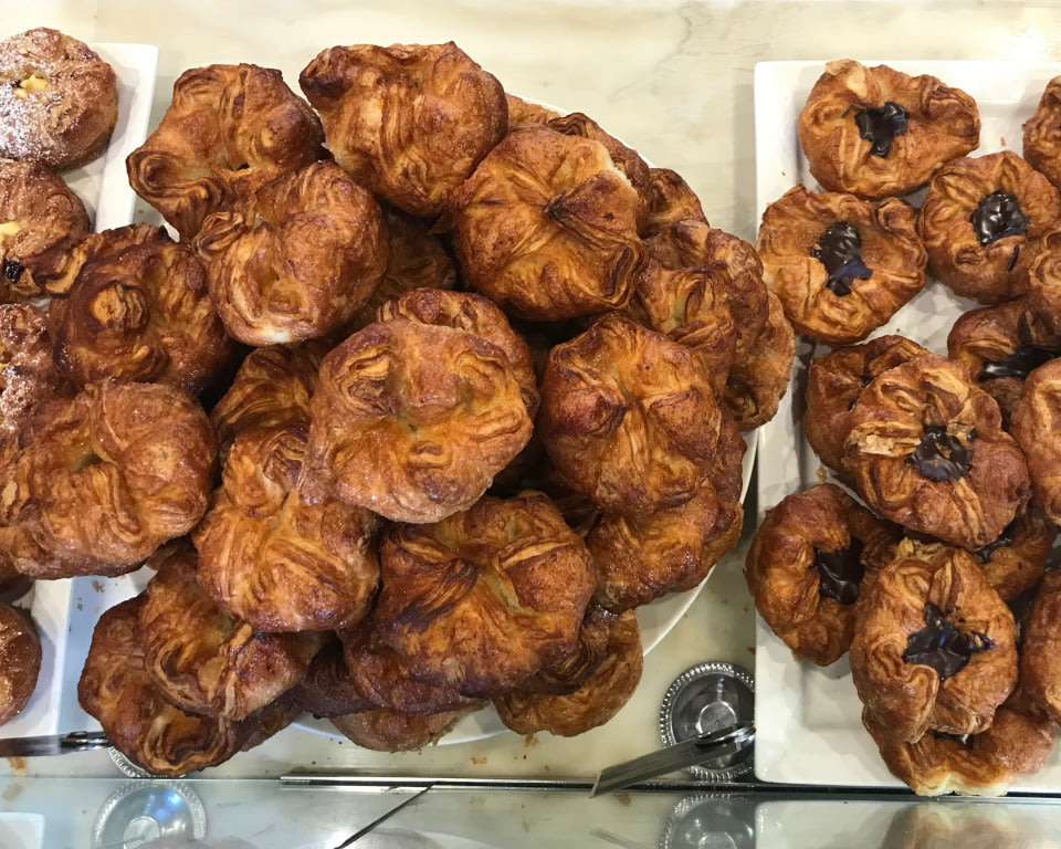 an overhead photo of an assortment of baked goods on a counter top