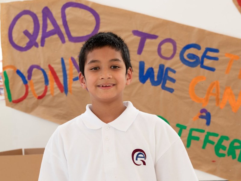 QF students share school supplies with Afghan refugees - QF - 08