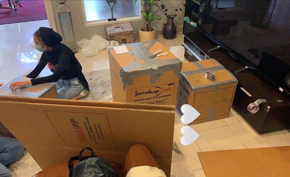 Image 4 QF students preparing donation boxes