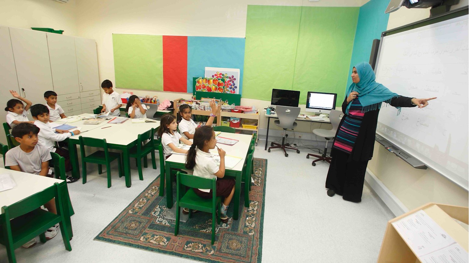 To mark International Women’s Day - two Qatari teachers at QF share their experiences of working from home - QF - 02