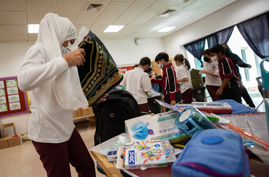 QF students share school supplies with Afghan refugees - QF - 03