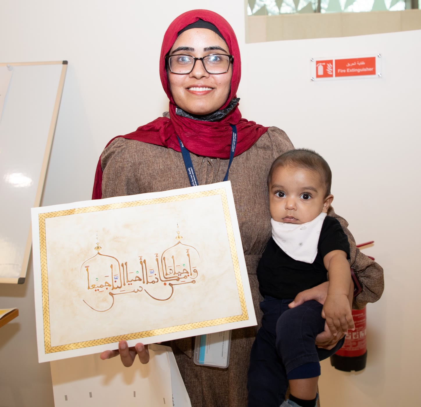 “I feel very connected with the calligraphy of Qur’anic scripture on the building,” says Education City Mosque calligraphy competitor - QF - 05