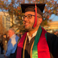 Salman at his graduation, in graduation cloak and hat