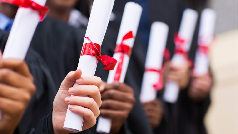 What is bachelor degree? A bachelor degree means you've earned a four-year university certification. After deciding between a ba vs bs, and understanding what is a bs degree, six international student graduates who earned a ba degree or a bs degree stand in a row and hold their rolled up diplomas tied with red ribbon. Get a list of bachelor degrees at international friendly universities from a Shorelight advisor.