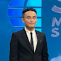 Reynard Misae, founder of Ploopy Animation, stands on set at a morning television show in Indonesia.